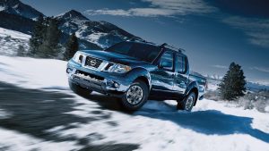 2020 Nissan Frontier Climbing in The Snow